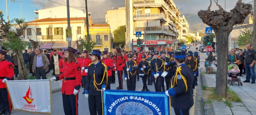 Kοινή εμφάνιση της Δημοτικής Φιλαρμονικής Δερβενίου και της Δημοτικής Φιλαρμονικής Αιγείρας στη Πάτρα για τη σφαγή των 10.000 Ελλήνων Πατρινών 